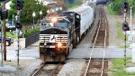 NS 9700 / C40-9W leading a mixed freightby the AMTRAK Station
